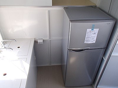 Japanese Food Trucks: Sinks (currently covered) and fridge inside of the food truck