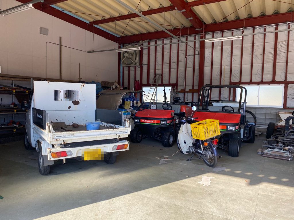 Kei Trucks in garage at Japanese Golf Course. Used for all grounds maintenance. Tree cutting and bush trimming. Import direct from Japan to UK
