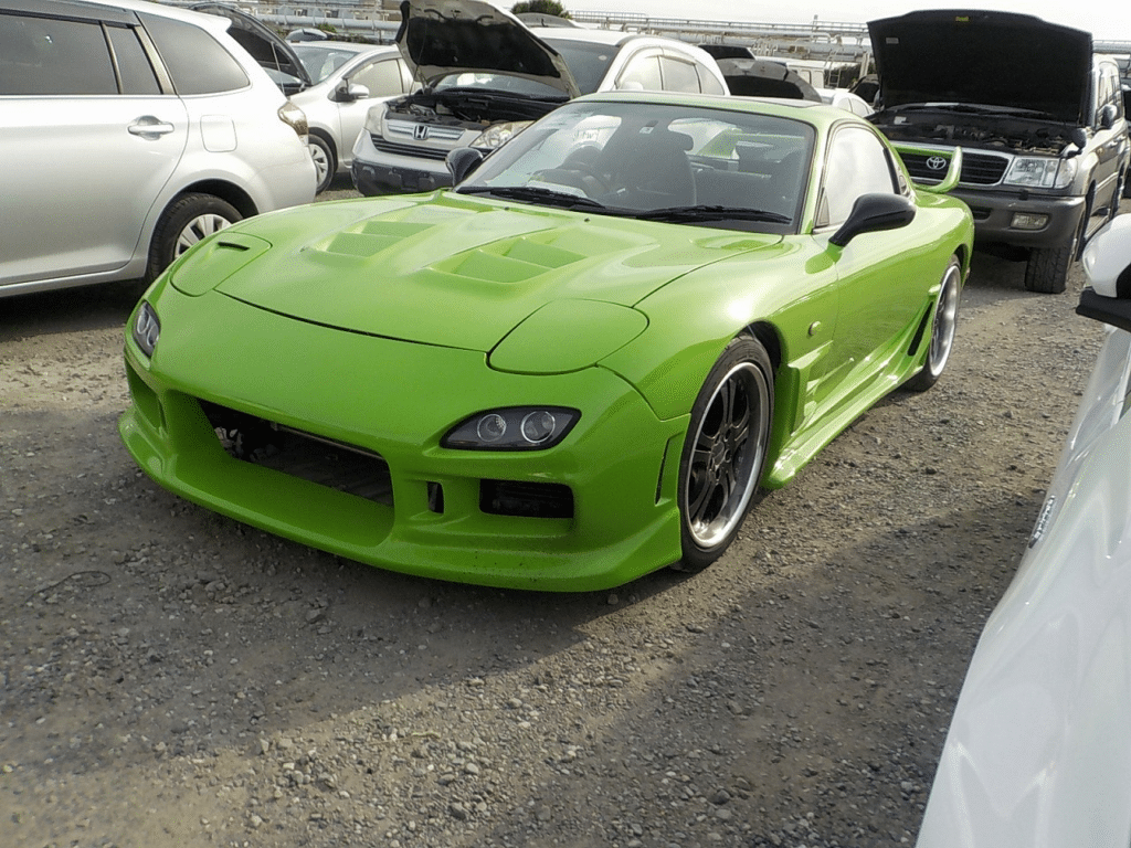 Mazda RX-7, Rx-7, JDM, Rotary Engine, Sports Car, Classic Car, Collector Car, Performance Car, Fun To Drive, Green Car, Iconic Car, Japan Car Direct