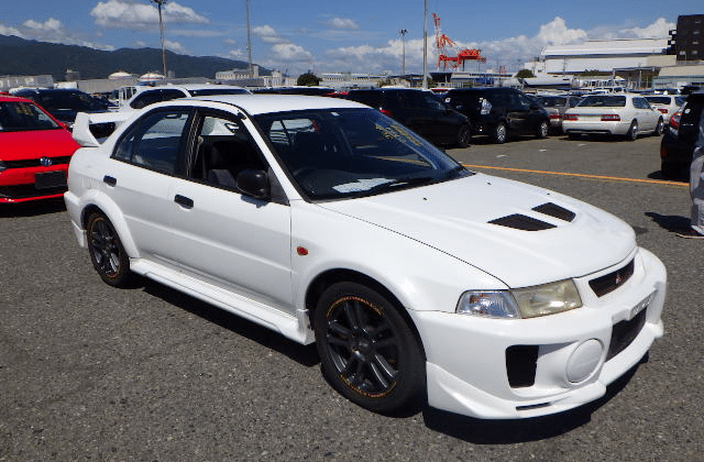 Mitsubishi Lancer, compact sedan, sporty car, reliable daily driver, performance upgrades, rally heritage, used cars from Japan, Japanese car auction, JDM import, Japan Car Direct